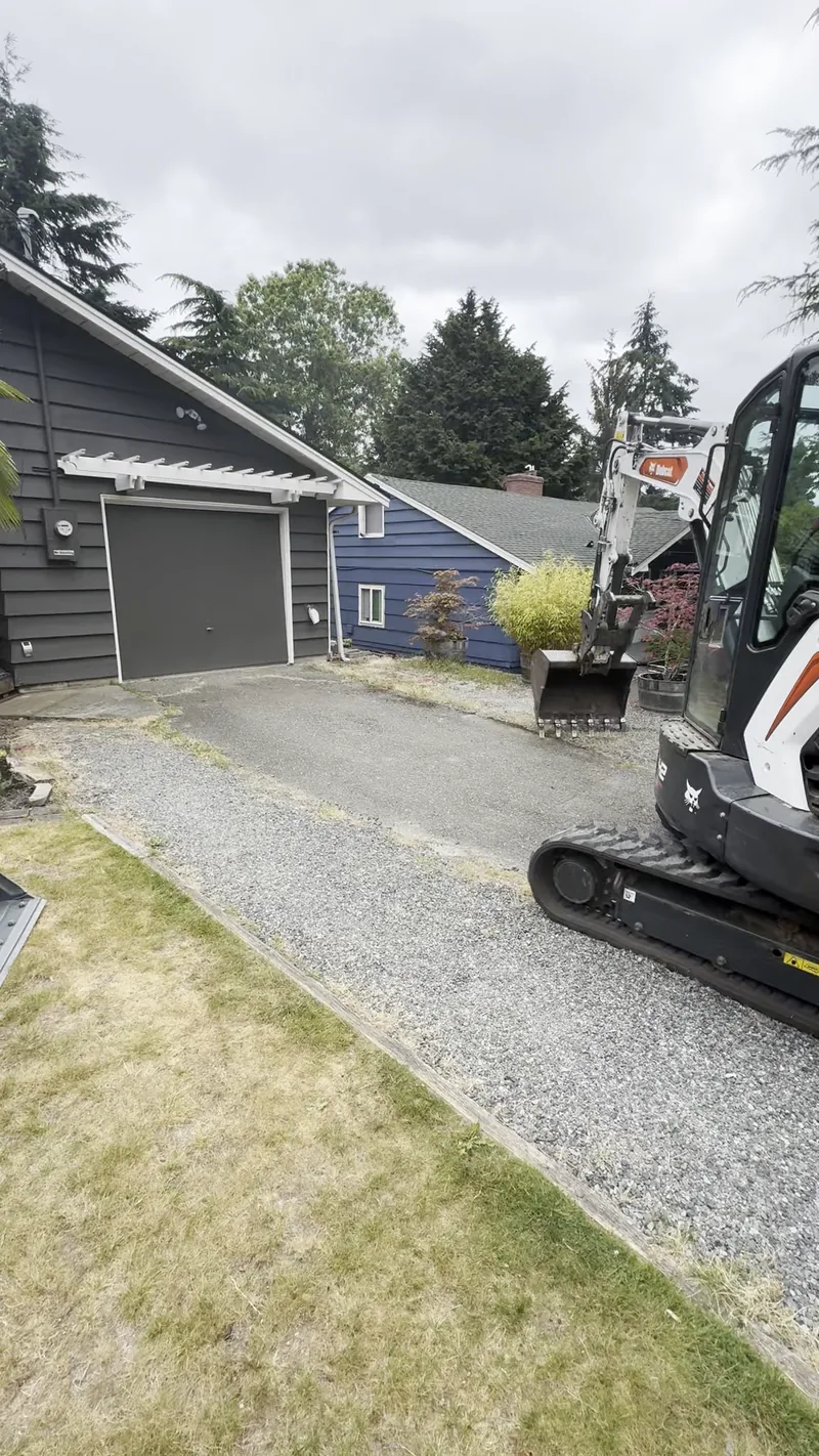 Old blacktop driveway before removal in Edmonds, WA